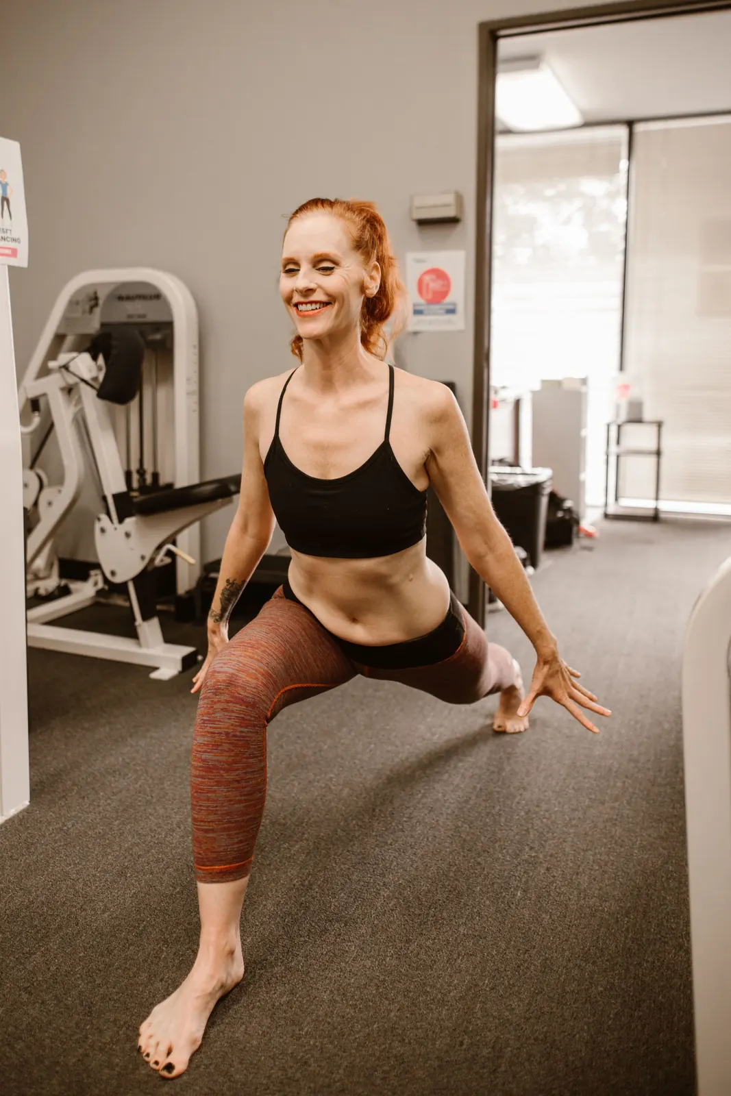 A woman doing a weight-bearing stretch